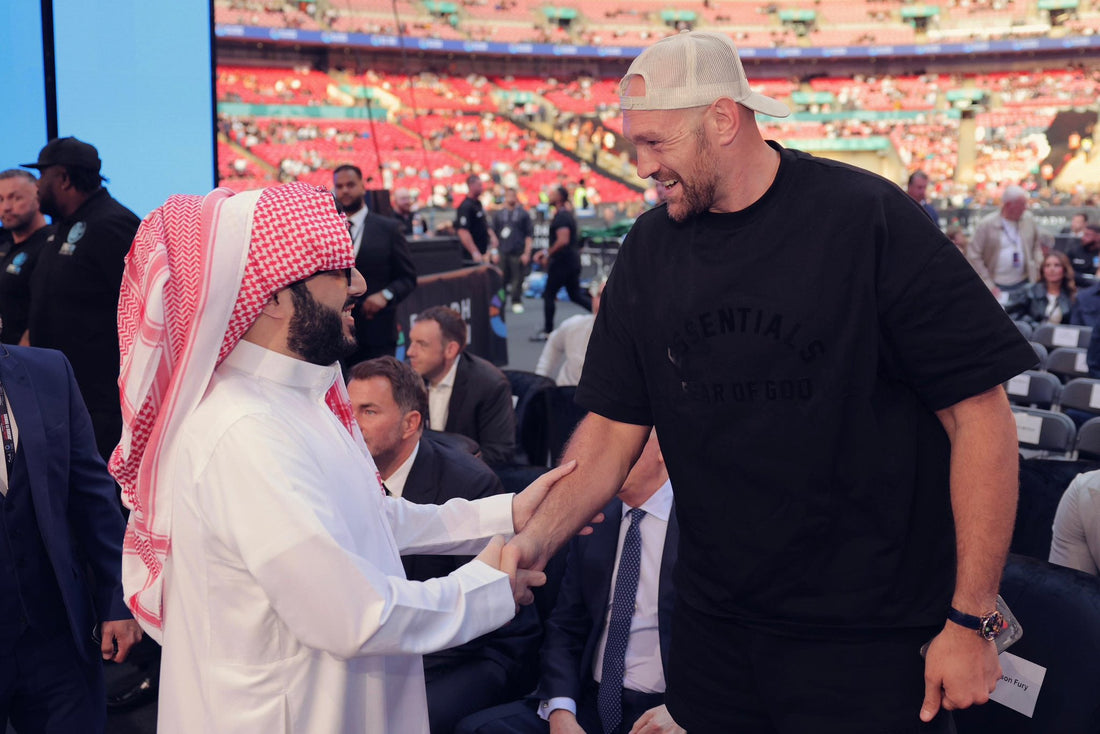 Tyson Fury shaking hands with Turki Alalshikh